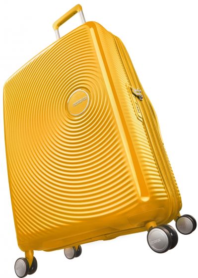 American Tourister Soundbox Spinner utvidbar trillekoffert 67 cm - gul