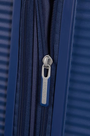 American Tourister Soundbox Spinner - expanderbar resväska 55 cm - blå
