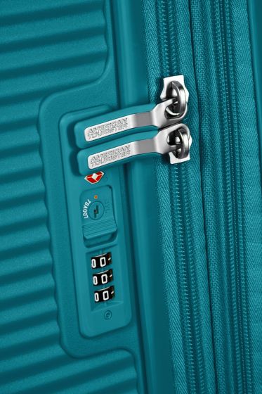 American Tourister Soundbox Spinner - expanderbar resväska 77 cm - grön