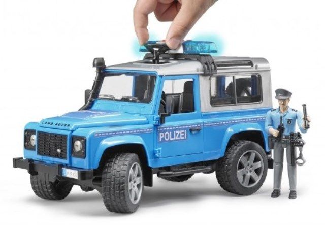 Bruder Land Rover Defender St. Wagon politikjøretøy med pilitimann og tilbehør - 02597