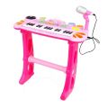 Keyboard med mikrofon og skammel - sjove lyde og tangenter - lyserød og hvid