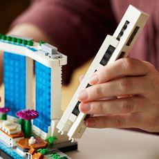 Gjengi One Raffle Place-bygningens unike form i LEGO®-stil