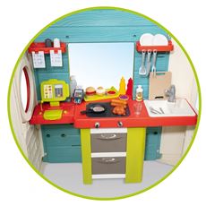 Fullt utstyrt lekekjøkken med ovn og stekeplate, kjøkkenutstyr og vask