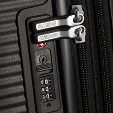 American Tourister utvidbar koffert med nedfelt TSA-kodelås