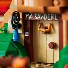 LEGO Ideas Brumms hus under et stort eiketre i Hundremeterskogen